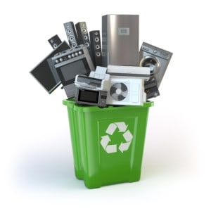 Picture showing large domestic appliances in a recycling bin.
