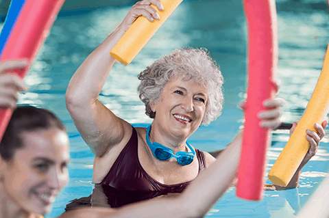 elderly woman doing water therapy